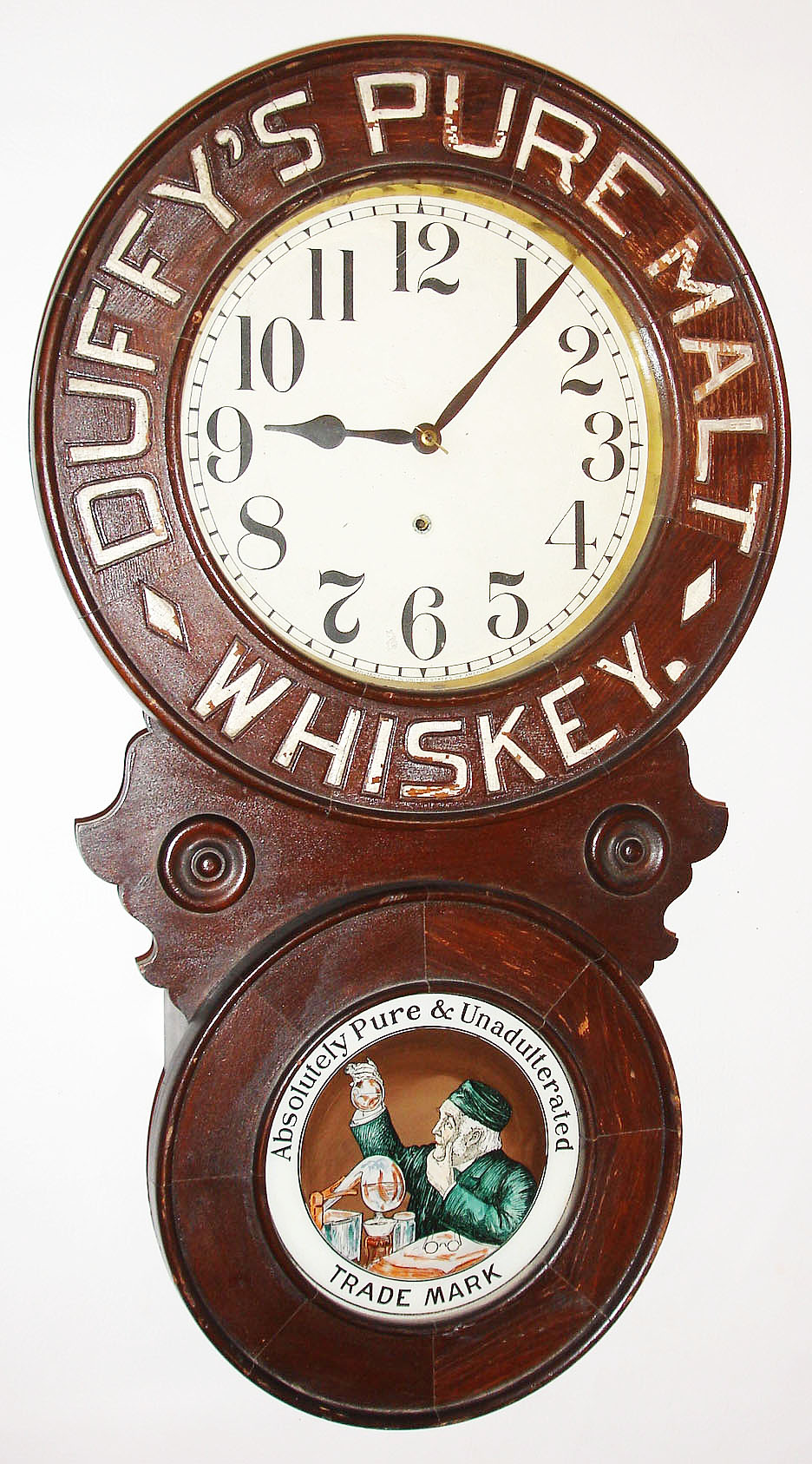 New Haven Clock Co., New Haven, Conn., advertising wall clock for "DUFFY'S PURE MALT WHISKEY", 8 day, time only, spring driven movement in a painted wood case with silk screened lower glass advertising "ABSOLUTELY PURE AND UNADULTERATED TRADEMARK" and painted metal dial, c1910 — Antique Clocks Price Guide