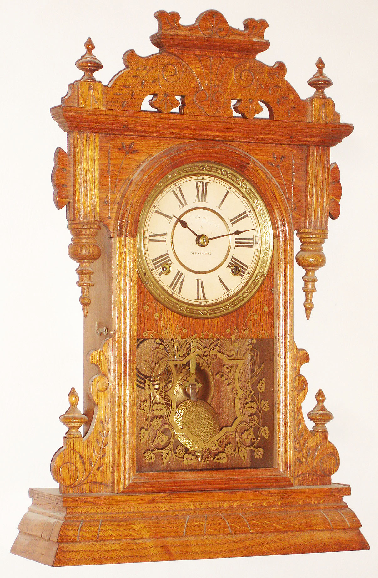 Seth Thomas Clock Co., Thomaston, Conn., "Tampa" oak time and strike 8 day city mantel clock, c1894 — Antique Clocks Price Guide