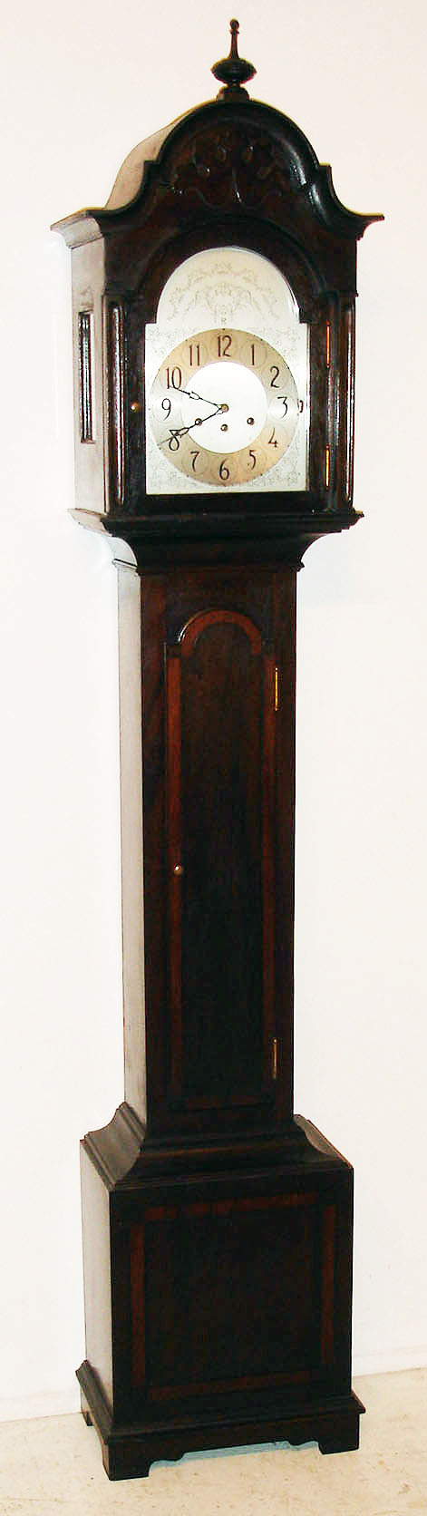 Herschede Hall Clock Co., Cincinnati OH, "Model 10" grandmother clock, 8 day, time, strike and Westminster chime on gong, spring driven movement with pendulum in a walnut case with silvered metal dial, c1920 — Antique Clocks Price Guide