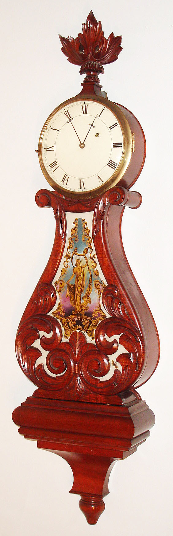 Nelson H. Brown, Boston, Mass., "Lyre Banjo" wall clock, 8 day, time only, weight driven movement apparently by Chelsea Clock Co. in a mahogany case with reverse painted tablet and painted metal dial, c1920 — Antique Clocks Price Guide