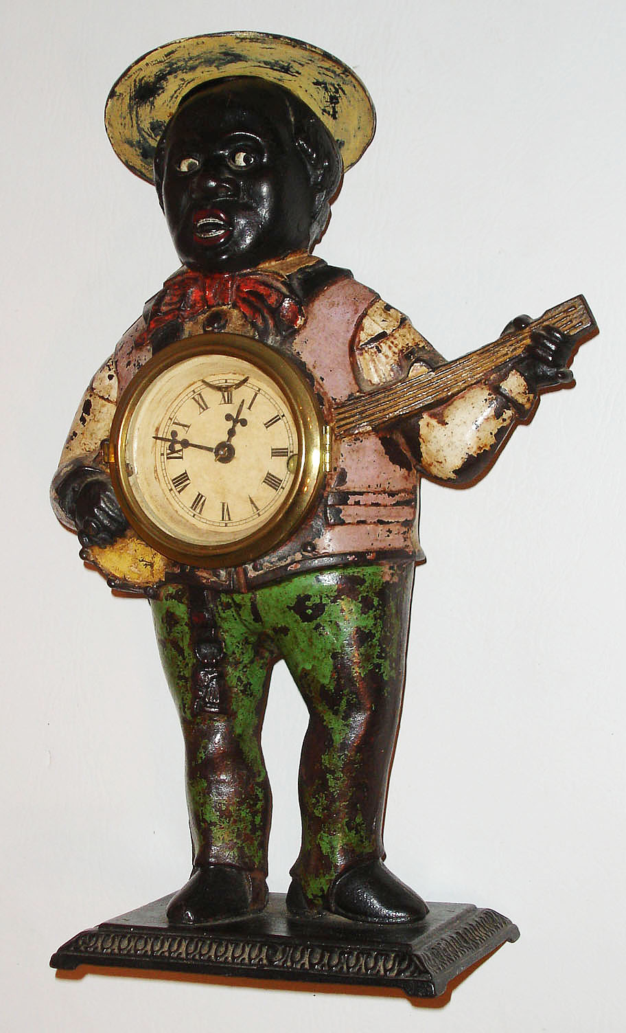 Bradley and Hubbard, Meriden, Conn.,  "Sambo", 30 hour, lever movement painted cast iron novelty timepiece, c1860. — Antique Clocks Price Guide
