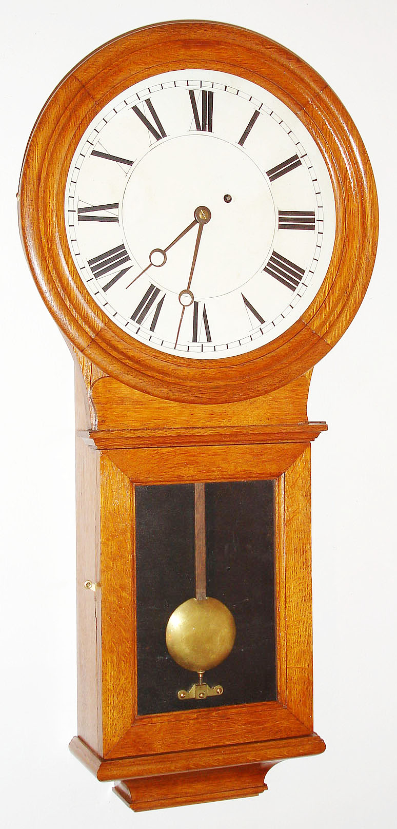 Eastman Clock Co., Boston , 8 day, weight wall time piece in an oak case with painted metal dial, serial number 688, c1886 — Antique Clocks Price Guide