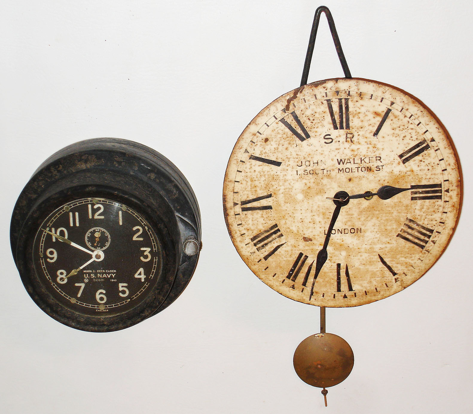 Clocks- 2 (Two) hanging 8 day timepieces:  Chelsea Clock Co., phenolic Mark I Deck Clock, U.S. Navy, 1943; John Walker, London, wag on wall with fusee movement, c1910 — Antique Clocks Price Guide
