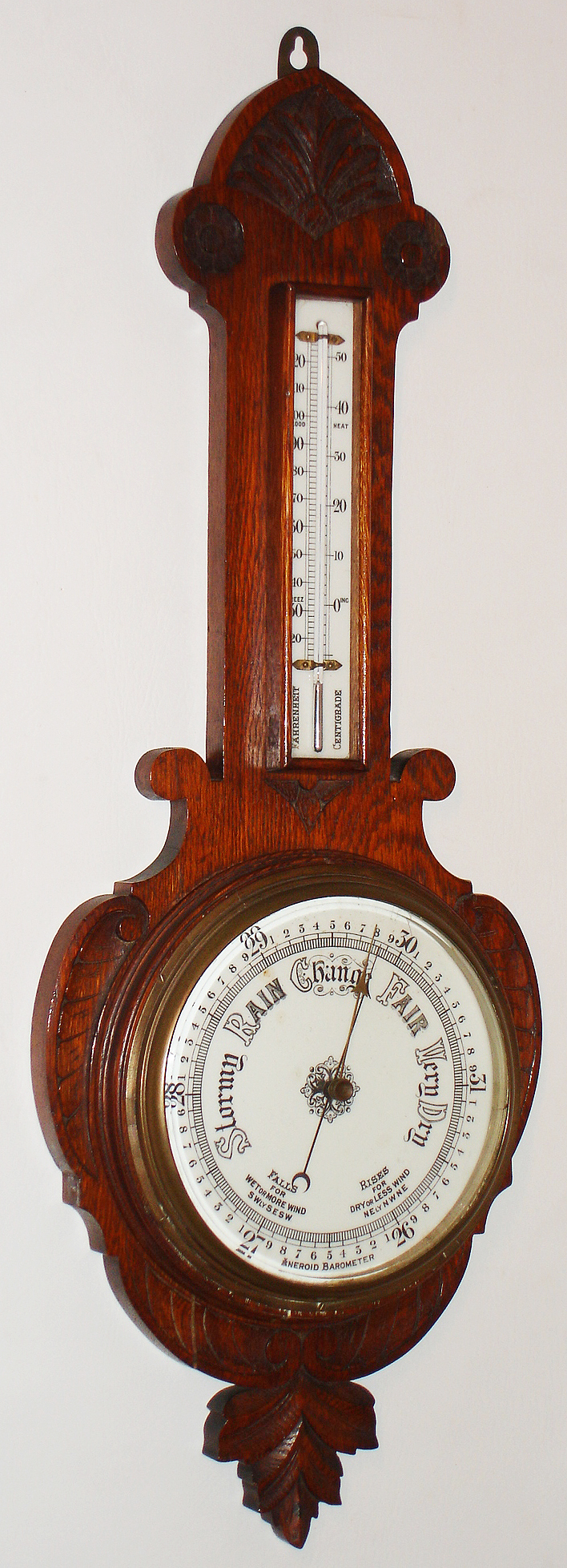Barometer, probably English, oak aneroid instrument with mercury dual scale thermometer, c1920 — Antique Clocks Price Guide