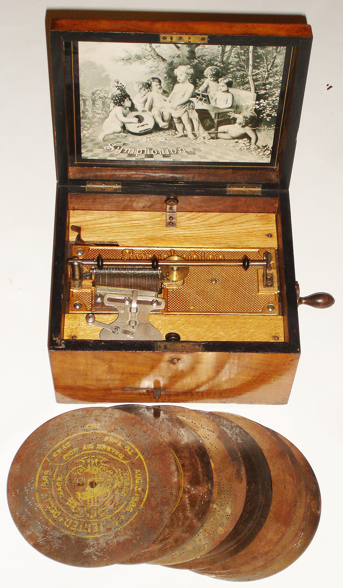Symphonion German metal disk wood case music box, style 10N with full cross bar, side crank, with 9 disks, [19.5cm], c1900 — Antique Clocks Price Guide