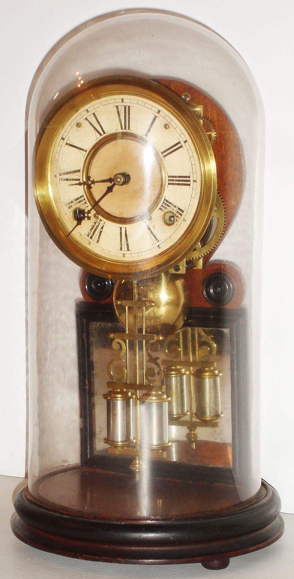 H. J.  Davies, New York "Crystal Gem" walnut, 8 day, time and strike, clock with glass dome, c1875 — Antique Clocks Price Guide