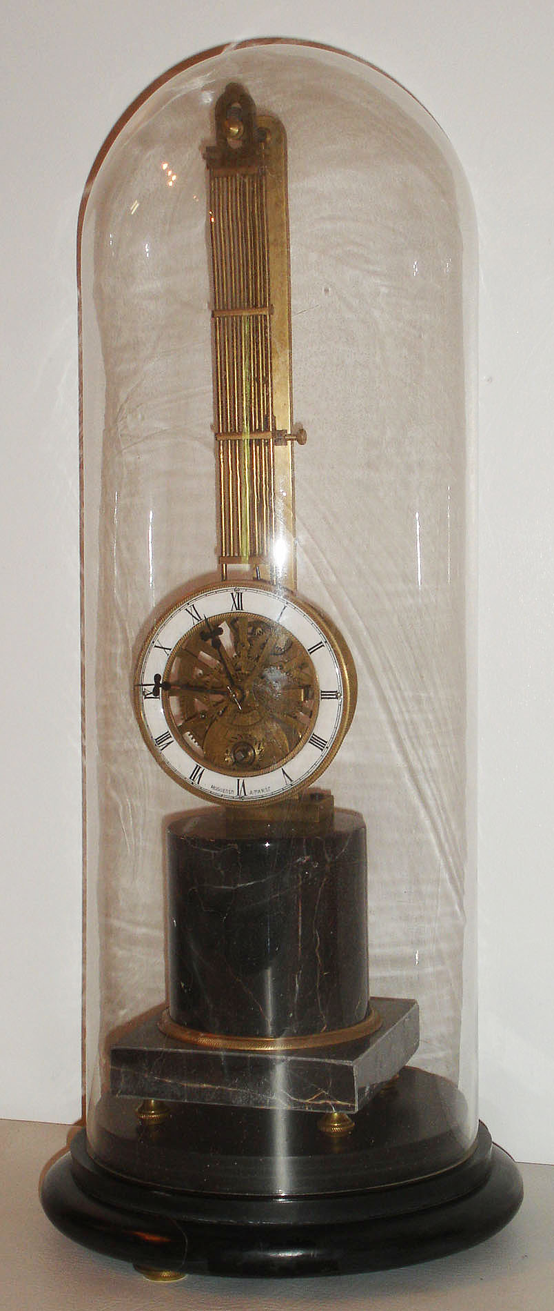 Reproduction Asian upside-down 8 day swinger signed "Huguenin A Paris" on marble base with glass dome, modern — Antique Clocks Price Guide