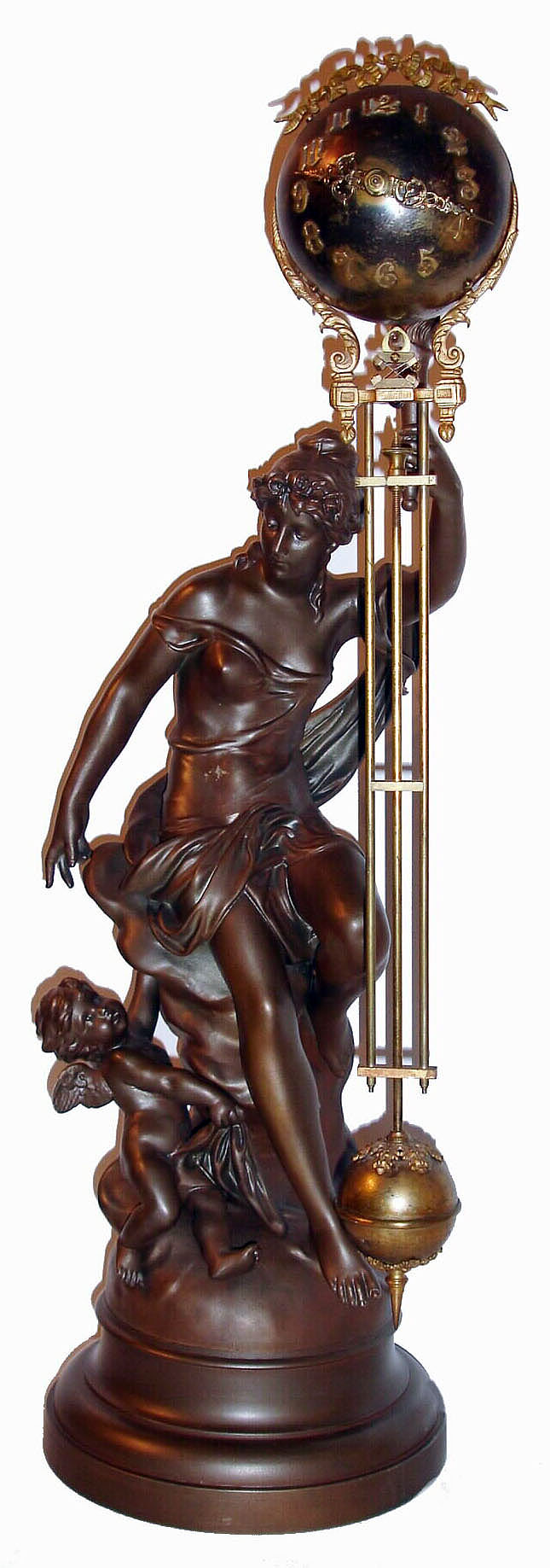 Ansonia Clock Co., NY, "FORTUNA" double figure swing clock.  The eight day time only movement contained in a metal sphere with blue finish with Arabic numerals, gilt ribbon with bowknot at top and French style hands, the pendulum portion with 3 rods supporting a smaller blue sphere with gilt cast leaf ornament, the draped female figure sitting on clouds with a torch held up in her left hand, a bar fixed to the torch supporting the clock, a putti below on her right, on a molded metal base, c1905 — Antique Clocks Price Guide