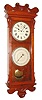 New Haven Clock Co., New Haven, Conn., "Austrian Calendar" wall clock, 30 day, time and calendar, spring driven movement in a cherry case with painted metal dials, c1900