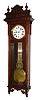 Waterbury Clock Co., Waterbury, Conn., "Regulator No. 60" wall clock, 8 day, time only, weight driven movement with deadbeat anchor escapement, sweep seconds and gridiron pendulum in an oak case with white enamel dial signed at bottom "MANUFACTURED BY WATERBURY CLOCK CO. U.S.A." and Waterbury G-clef hands, c1903