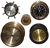 Clocks- 5 (Five) round metal and phenolic clocks, 19th and 20th centuries