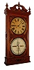 Ithaca Calendar Clock Co., Ithaca, NY, "Regulator No. 1 or Hanging Bank", 8 day, time and perpetual calendar, two weight driven movement in a walnut case with applied crushed shell moldings and papered metal dials, dated 1870