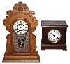 Clocks- 2 (Two), 8 day, time and strike, wood mantel clocks: Ansonia oak kitchen clock; Sessions "Leader No. 1" mahogany finish cabinet case;  c1900 and 1921