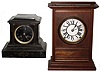 Clocks- 2 (Two), 8 day, time and strike, mantel clocks: French black marble; custom-made mahogany case with Seth Thomas movement; 20th century
