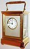 France, large and unusual year running carriage clock, the polished brass Corniche case with beveled glass panels, matte finished gilt frame for matte silver dial mat, white enamel dial with Arabic numerals, blued steel Breguet style hands with hollow tips, the movement made in two sections, the upper with a standard French carriage train, the lower with two large barrels and second wheel, engaging with the upper train, two wheels with steel end piece on back plate, large silvered lever platform, c1900