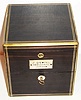 England, chronometer no. 4653 by J. Sewill, London, two day fusee movement with spring detent escapement, chronometer balance with helical hairspring, spotted plates, silvered Roman numeral dial with Arabic five minute markers, up/ down indicator, dial signed J. Sewill, 30 Cornhill, Royal Exchange, London, Maker to the Admiralty, also marked with mention of awards received in London 1862 and Paris 1867, blued steel seconds hand, gold hour and minute hands, lacquered brass bowl in gimbals with locking lever, ratchet type key correct and possibly original, beautiful ebony box with brass binding and hardware, mother of pearl plate on front of box marked J. Sewill 30 Cornhill London c1870