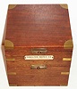 Hamilton Watch Co., Lancaster, Penn., model 21 chronometer no. 4810, key wound, two day, fourteen jewel movement with cotes de Geneve decoration, fusee, spring detent escapement and helical hairspring, matte silver Arabic numeral dial with up/ down indicator, dial signed Hamilton Lancaster Pa., U.S.A., black finished steel hands, original winding key, brass bound mahogany box with gimbals and locking lever, inside of box lid with instructions and illustration of correct way to lock balance, includes Hamilton marine chronometer display card, c1941