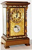 France, for Wright, Kay and Co., Detroit, eight day time and strike crystal regulator in a large size, polished brass case with columns, columns and case with champleve enamel ornament, gilt dial mask decorated with engraved acanthus leaf on a matted ground, pierced and engraved gilt dial with Arabic numerals and champleve border, with a well executed portrait miniature of a fashionable young woman below the six, blued steel hands, four beveled glass panels, round French movement with Brocot escapement, striking the hours and half hours on a gong, mercury pendulum c1880