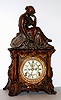 Ansonia Clock Co., New York, NY, "MINERVA" and figure, cast metal mantle clock, dial with open escapement.  Note the Minerva name had been used on a different model in 1874, this model c1904