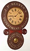 Baird Clock Co., Plattsburgh, NY, "J.P. Becker's Department Bazaar" miniature advertising wall clock, 8 day, time only, spring driven movement in wooden case with paper mache doors and paper dial, c1893