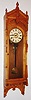 F. Kroeber Clock Co., New York, NY "Regulator No. 47" wall clock, 8 day, time and strike, spring driven movement in an ash case with paper dial, c1884