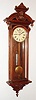 Wm. L. Gilbert Clock Co., Winsted, Conn., "Regulator No. 4", 8 day, time only, weight driven movement in a walnut case with rosewood backboard and a paper dial, c1881