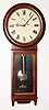 Seth Thomas Clock Co., Thomaston, Conn., "Regulator No. 1" wall clock, 8 day, time only, weight driven movement in a rosewood veneer case with painted metal dial and nickel damascene pendulum bob and nickel weight, c1886