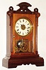Seth Thomas Clock Co., Thomaston, Conn., "Norfolk" walnut 8 day time, strike and alarm city shelf clock, c1884