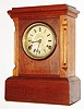 George B. Owen, 30 hour, time and strike, small walnut mantel clock. Stamped on the front of the base": "Geo. B. Owen, Pat. June 17, 1862".   c1862