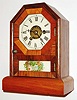 Seth Thomas Clock Co., Thomaston, Conn., "Cottage E", 30 hour, time/alarm with an E-type movement timepiece, c1865