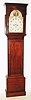 Scottish tall clock, 8 day, time and bell strike, weight driven movement in a mahogany and mahogany veneer case with flat top hood, reeded columns on trunk and hood and painted metal dial, c1820
