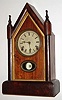 Wm. L. Gilbert Clock Co., "Owen Patent", 8 day, time and strike steeple clock with a calendar mechanism invented by George B. Owen in 1866.