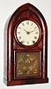 Brewster and Ingrahams, 8 day, time and strike rack striking iron backplate movement beehive shelf clock.  C.1845