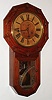 Wm. L. Gilbert Clock Co., Winsted, Conn., "Star Drop" walnut, 8 day, time and strike, long drop wall clock, C1881