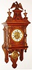 L. Furtwangler and Sohne Germany, 8 day time and quarter-strike free-swinger walnut wall clock, c1920