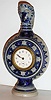 German ceramic jug-form case with Connecticut 30 hour insert movement, c1895