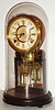 H. J.  Davies, New York "Crystal Gem" walnut, 8 day, time and strike, clock with glass dome, c1875