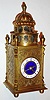 France, grand sonnerie striking desk or table clock, the engraved and gilt case in the style of early 17th century German work, French eight day time and strike carriage clock movement, striking and repeating on gongs, with lever platform escapement, white enamel Arabic numeral dial with blue enamel center, steel hands, back of case marked "Planchon au Palais Royal", sonnerie/ silence controlled by lever under case, c1910