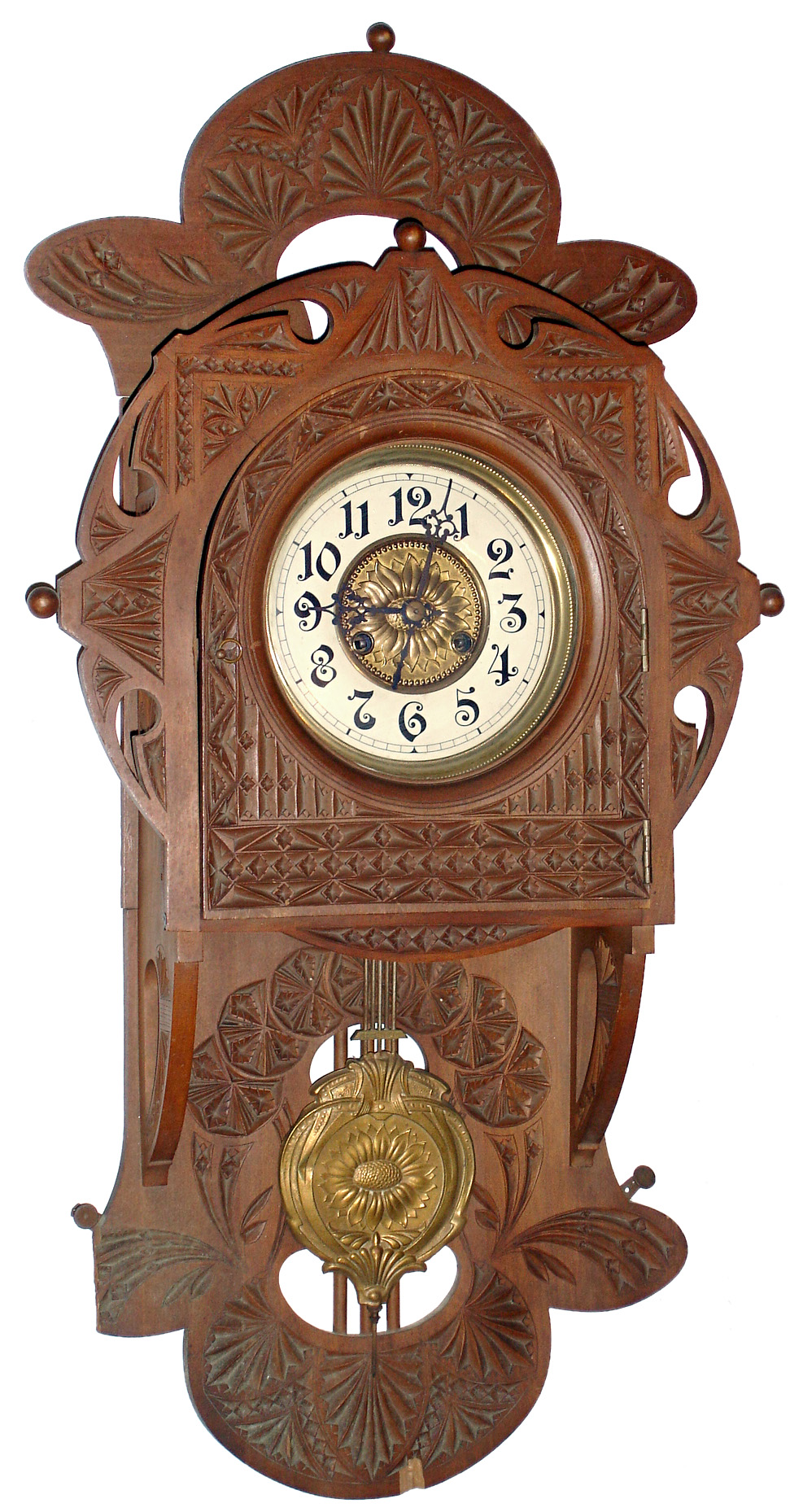 Carl Werner, Villingen, Germany, 8 days, spring driven time and strike, free-swinger carved wood wall clock, c1890 — Antique Clocks Price Guide