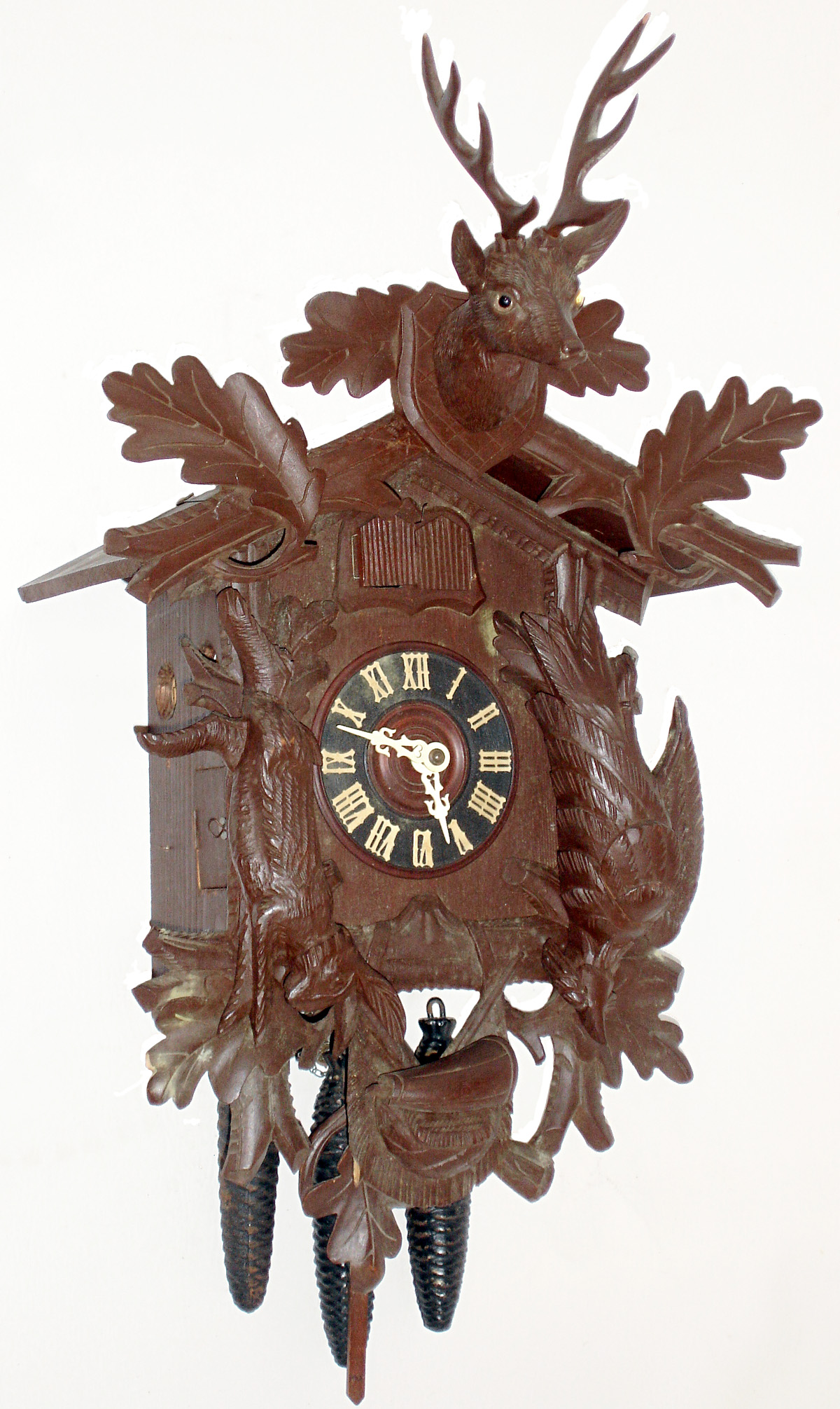 German carved wood three weight quarter striking cuckoo and quail wall hanging clock, c1910 — Antique Clocks Price Guide