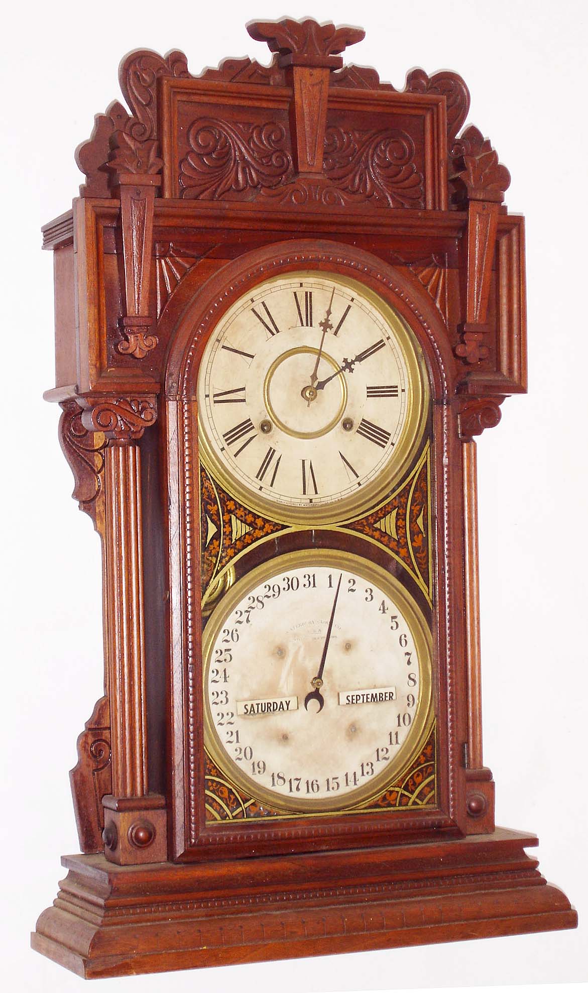 Waterbury Clock Co., Waterbury, Conn. "Calendar No. 43" double dial perpetual calendar 8 days, time and strike, spring driven walnut shelf clock, c1912 — Antique Clocks Price Guide