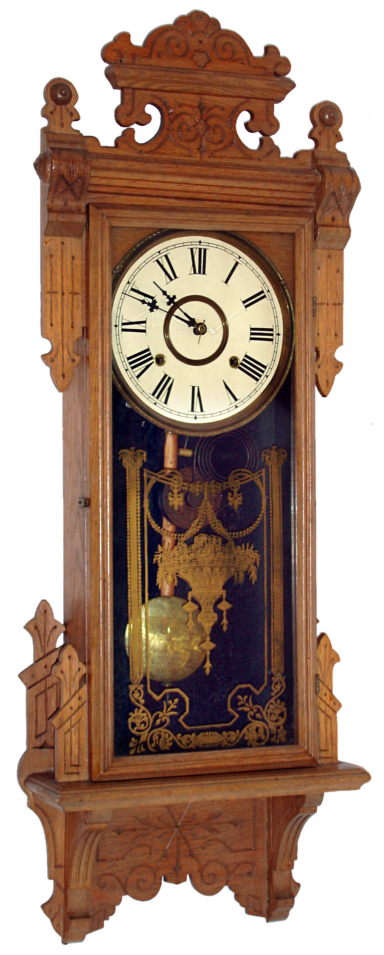 William L. Gilbert Clock Co., Winsted, Conn., "Thespian" walnut 8 days, time and strike, wall clock, c1910 — Antique Clocks Price Guide