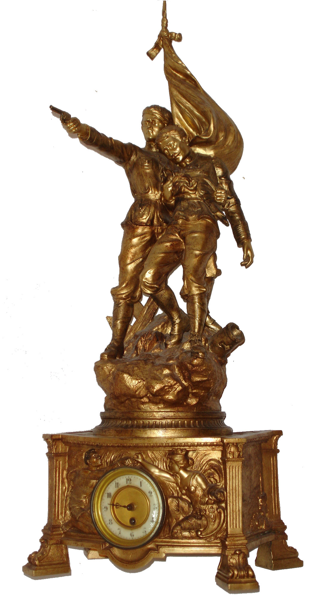 Large French figural clock, 8 days, time only, movement, gilt spelter case supported on acanthus decorated feet with Corinthian pilasters at the corners, case sides with tropical landscapes, the front with a chained slave to the left of the dial, and a crowned female figure holding the end of the chain to the right, the case top with two soldiers before a planted flag, one wounded, supported and defended by his comrade, sculpture signed but illegible, white enamel Arabic numeral dial with gilt, sunk center, gilt bezel with thick beveled glass, c1900 — Antique Clocks Price Guide