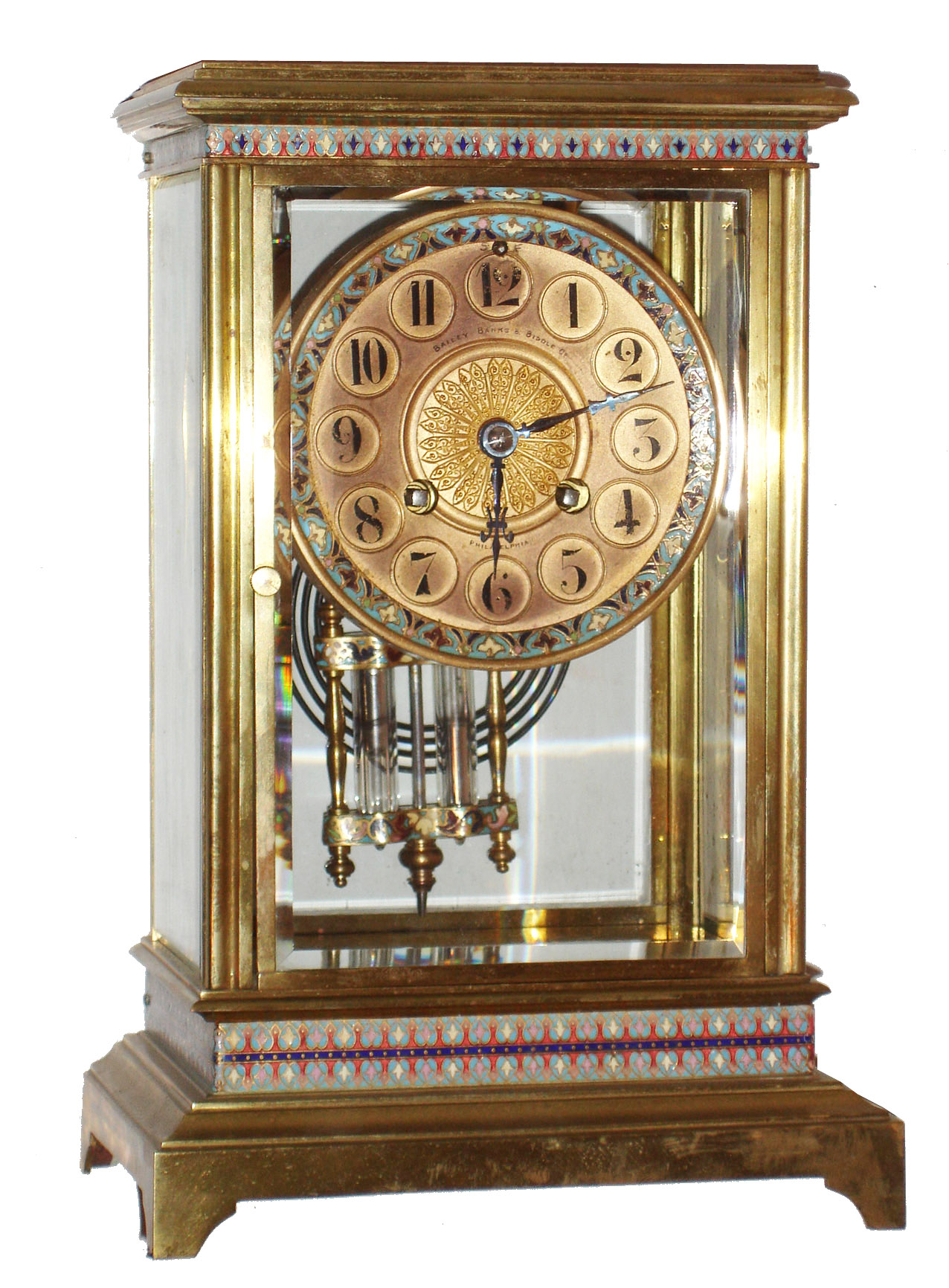 French crystal regulator, Marti &amp; Cie. 8 days, time and strike, movement with Brocot escapement, counting the hours on a gong and a single blow at the half hour, the gilt case with beveled glasses and cloisonne bands at the top and bottom, gilt Arabic numeral dial signed "Bailey, Banks and Biddle Co. Philadelphia", with cloisonne border and gilt filigree center, blued steel hands, gilt pendulum with cloisonne ornament, c1900 — Antique Clocks Price Guide
