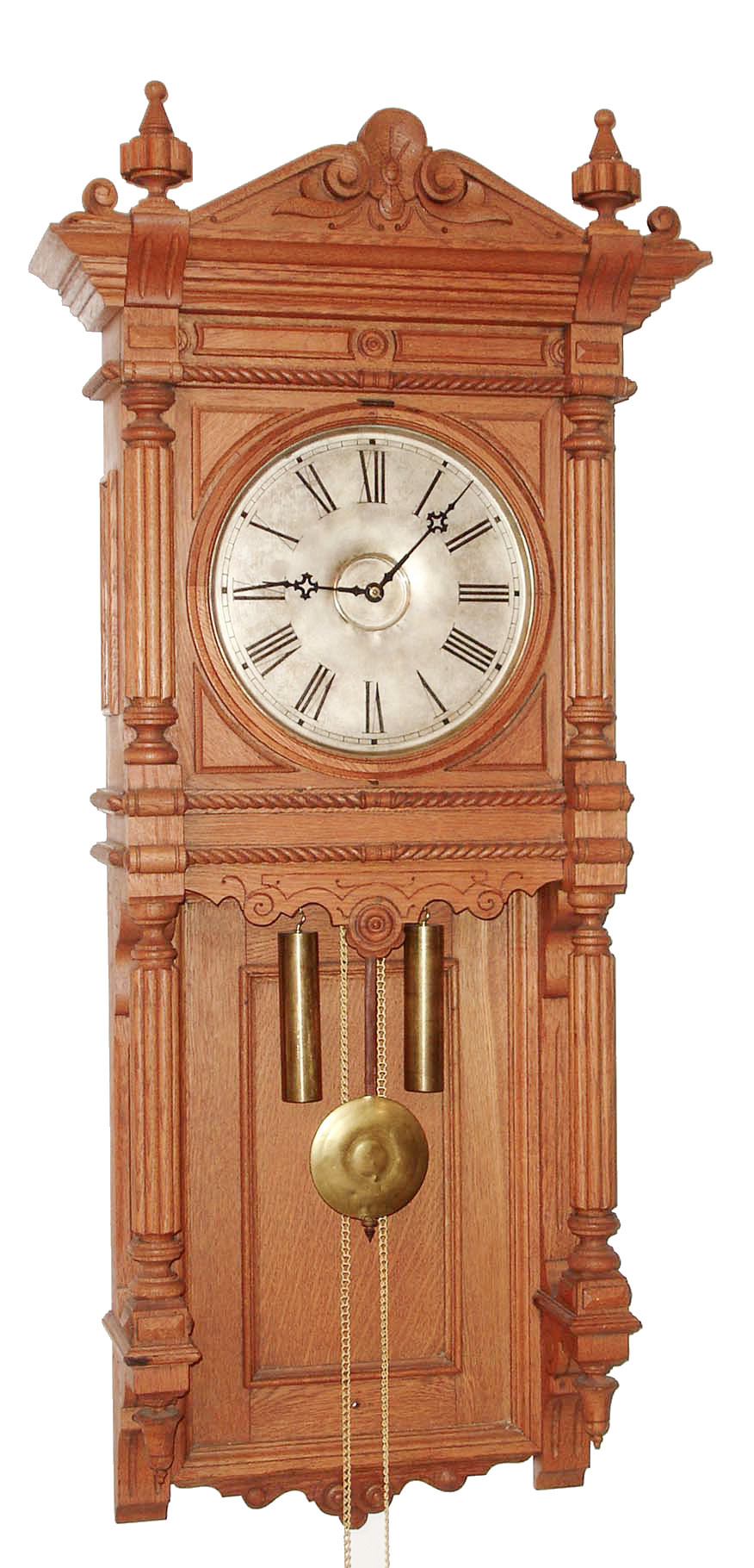 Waterbury Clock Co., Waterbury, Conn., "Atlanta", wall clock, 8 days, time and strike, two brass weight driven movement in an oak case with silvered metal dial, c1893 — Antique Clocks Price Guide