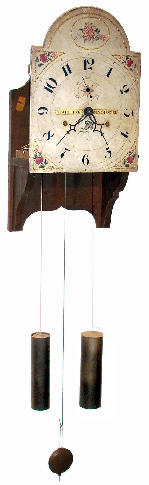 Riley Whiting, Winchester, Conn., movement complete for tall clock, 30 hours, time and strike, wooden works, now on an oak wall mounted bracket with painted wooden dial, c1825 — Antique Clocks Price Guide