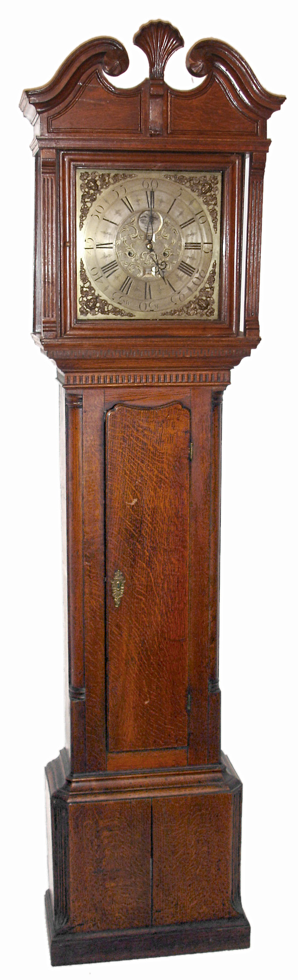 S. Whalley, Manchester, England tall clock, 8 days, time, calendar, moon phase and bell strike, weight driven movement in an oak case with broken arch hood and scallop finial and brass dial and spandrels, c1770 — Antique Clocks Price Guide
