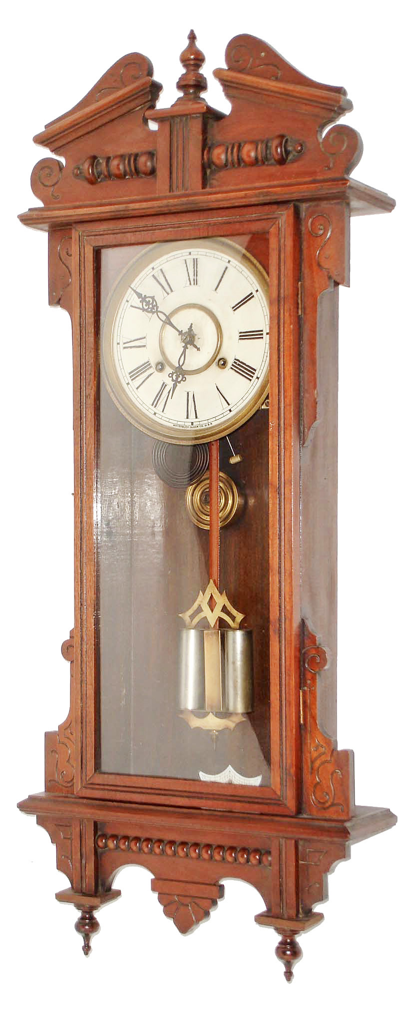 Waterbury Clock Co., Waterbury, Conn., "Eton", 8 day, time and strike, walnut wall clock. c1906. — Antique Clocks Price Guide