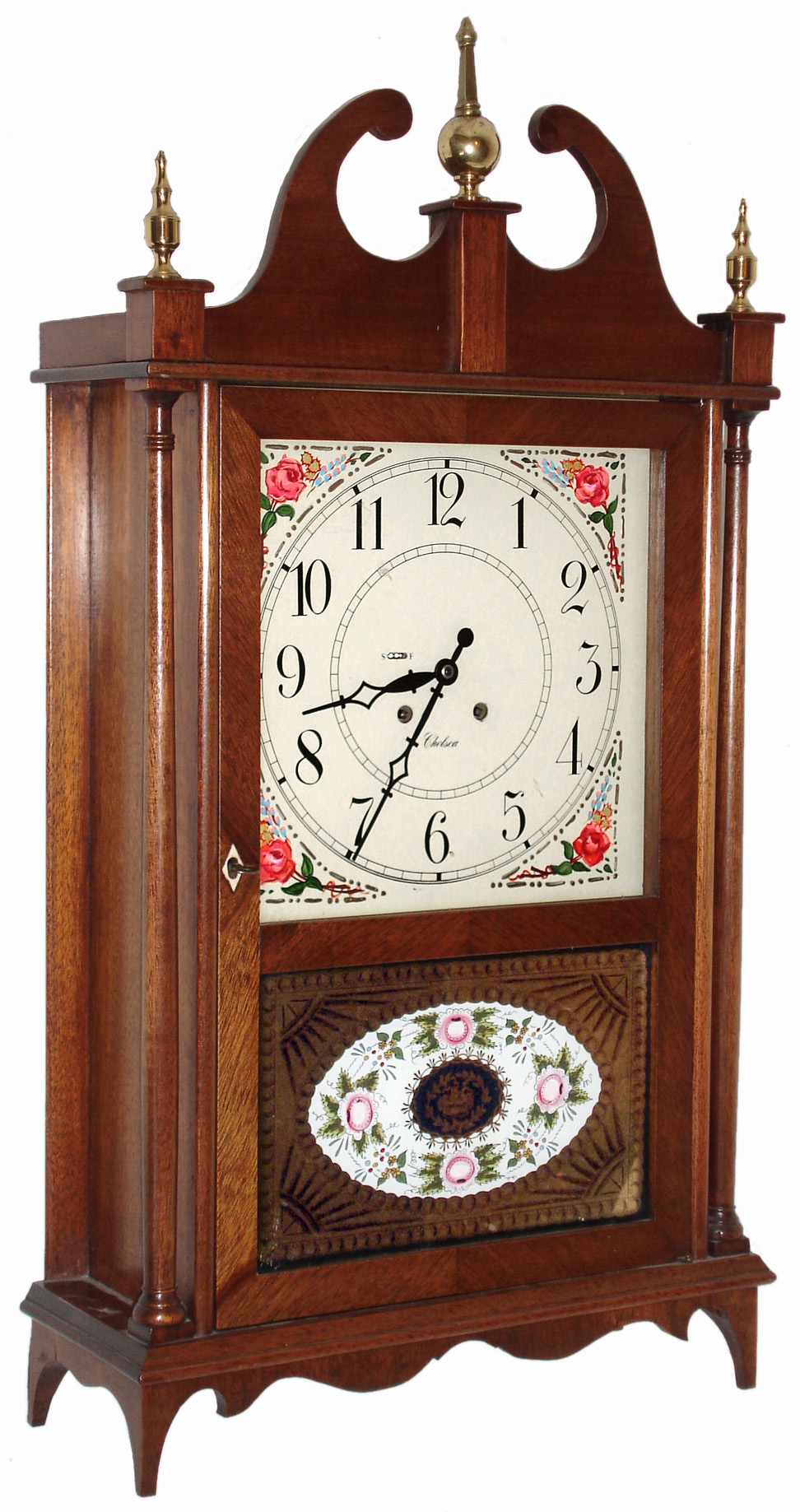 Chelsea Clock Co., Boston, Mass., "Terry" mahogany eight-day time and house strike pillar and scroll mantel clock, c1979 — Antique Clocks Price Guide