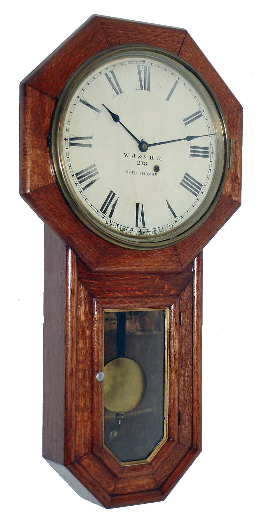 Seth Thomas Clock Co., Thomaston, Conn., "Globe", 8 day, quartered oak wall timepiece, c1896  The initials on the dial: "W. J. &amp; S. R. R." is the abbreviation for the "West Jersey &amp; Seashore Rail Road".  In the 1900 edition of "Statistics of Railways in the United States" this railroad operated under the Pennsylvania RR system claiming assets of over 11 million dollars, 330 miles of track and carrying 2 million passengers annually. — Antique Clocks Price Guide